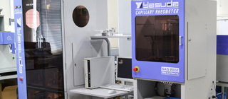 試験機60年の実績